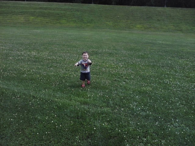 Photo of little boy running in God's backyard copyright 2013 - 2022 by Marion Weiscarger Roughsedge of Nippies Magazine - nippies.com. All rights reserved.